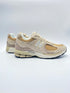 New Balance U2002RB beige Shipyard met incense en timberwolf